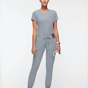 JAANUU Women's 2-Pocket Tuck-In Top